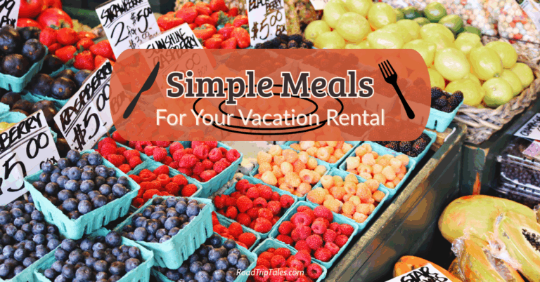 Farm stand with fresh berries and fruit in teal cartons, overlaid with text reading “Simple Vacation Rental Meals.”