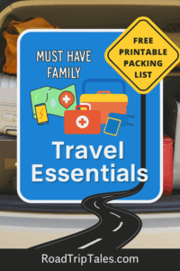 Illustrated road trip-themed Pinterest pin showing a blue highway sign labeled “Must Have Family Travel Essentials” with icons of a map, phone, cooler, and first aid kit. A yellow sign promotes a free printable packing list, and a winding road leads to the blog name RoadTripTales.com at the bottom.